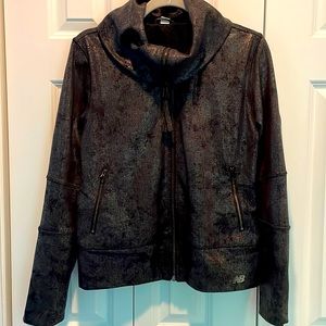 Cool exercise jacket from New Balance Studio